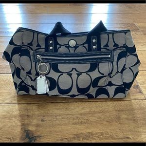 Black and pick coach bag